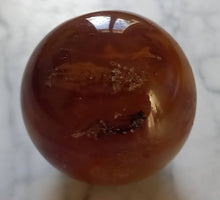 Load image into Gallery viewer, Sphère de Cornaline